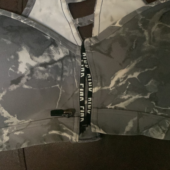 Selling a pink sports bra on good condition zipper need to be put back on - Picture 2 of 4